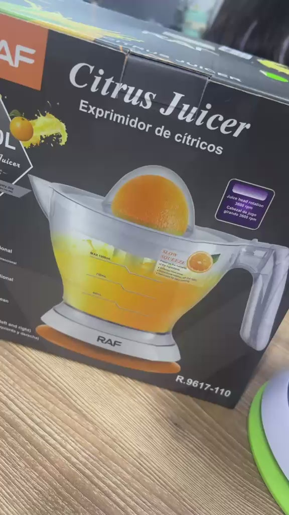 EXTRACTOR DE JUGOS MARCA RAF